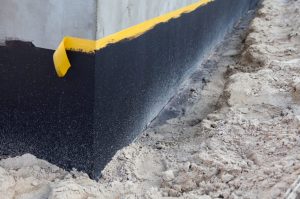 Hydroizolace základů během výstavby jako součást dokumentace stavby.